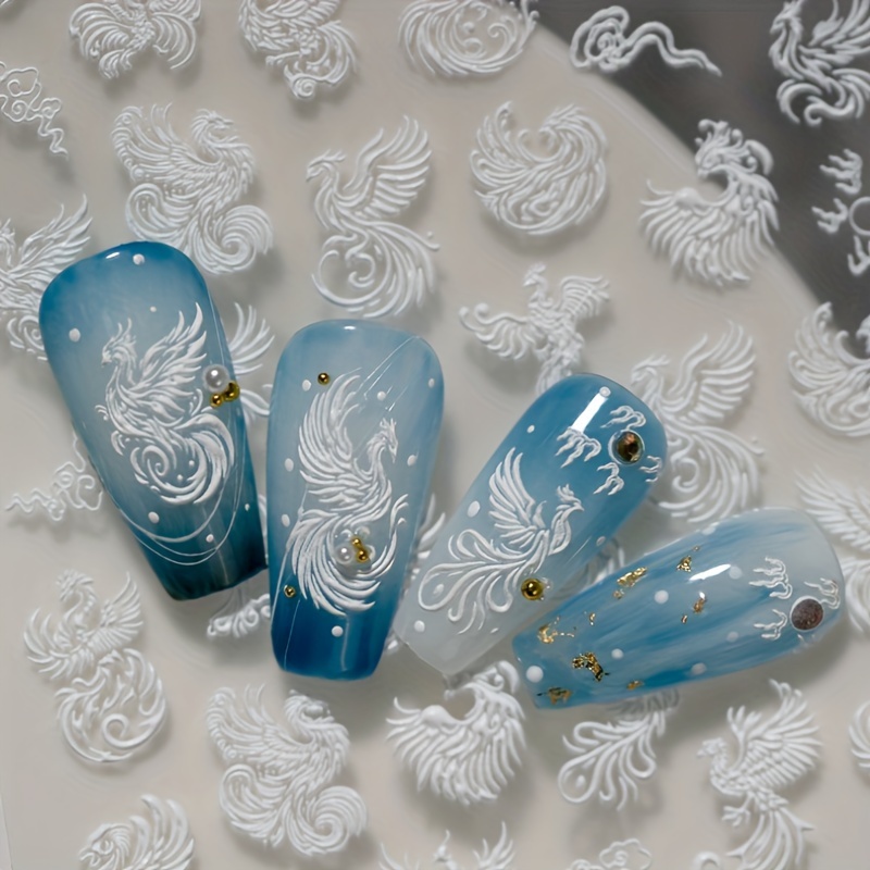 Image of A White Hand-drawn Phoenix Nail Art Sticker Featuring A Mythical Phoenix In Poses, Symbolizing And , Representing Of Birds And The Saying Of 'dragons Men And Phoenixes Women.' Poses Of The P