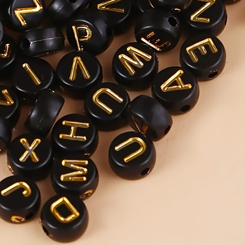 

200pcs Black & Golden Alphabet Beads - Acrylic Letter Charms For Making, Bracelets, Necklaces, Earrings - Craft Supplies For Small Businesses, Graphic Beads, Random Letter Beads