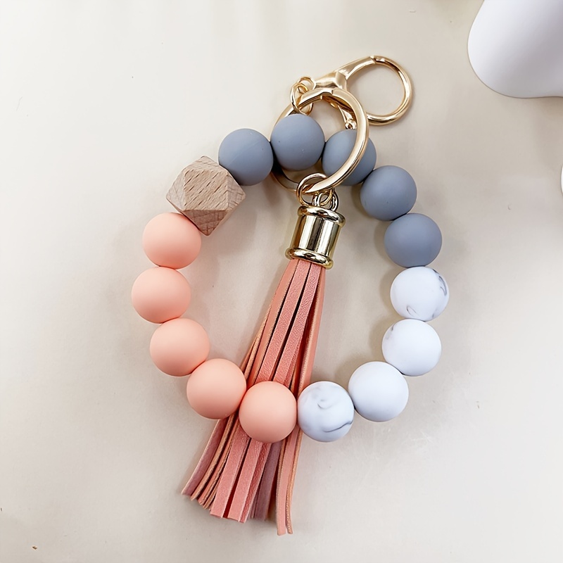 A Simple And Stylish Solid-color Marble Pattern Handmade Beaded Keychain With Tassel, Suitable For Bags, Car Keys As A Pendant. A Gift Idea For Mothers, Teachers, Or