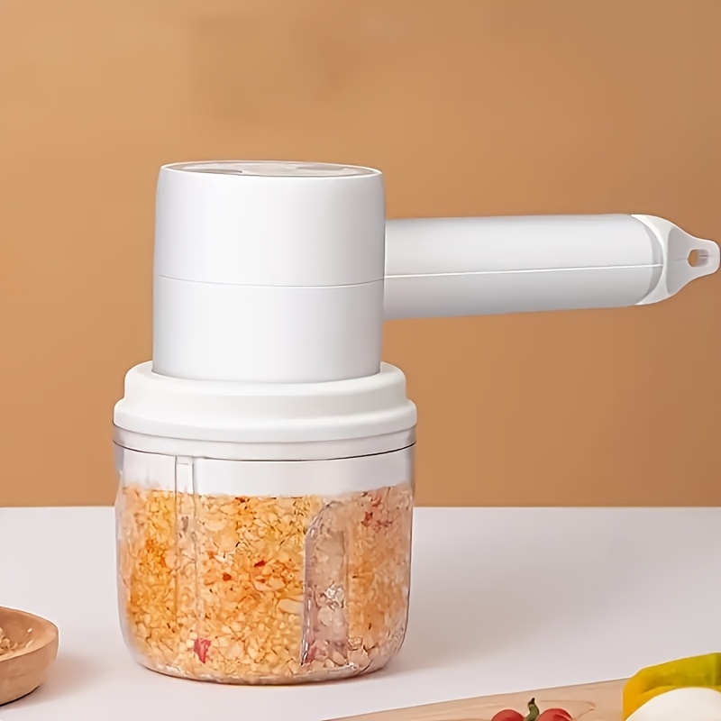 cordless electric garlic chopper and egg whisk a 2 in 1 hand mixer   usb rechargeable this set features a   adjustable egg beater and garlic mincer ideal for baking making cakes   butter tarts and chopping onions vegetables ginger and fruits Product details 5