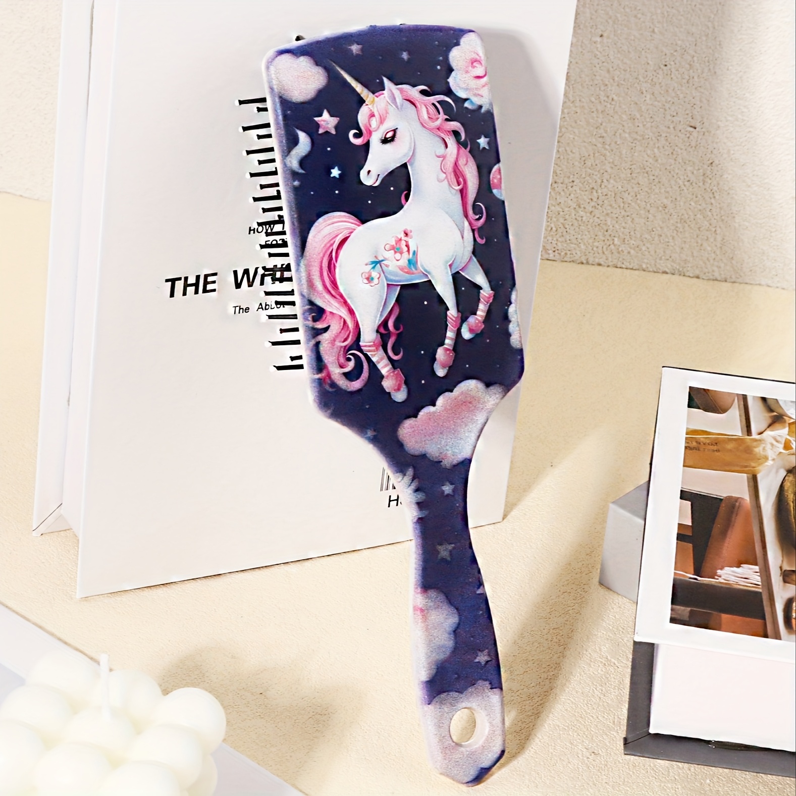 Image of A Cartoon Colorful Cushion Comb - A Massage And Exfoliating Brush, Featuring An Abs Plastic Handle And Nylon Bristles, Suitable For All Hair Types