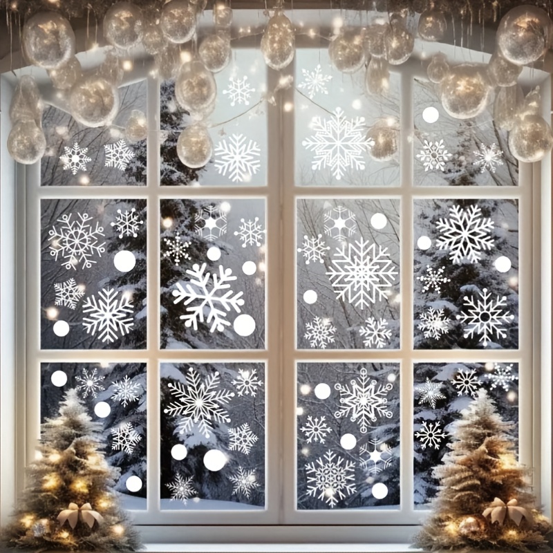 40pcs of snowflake window decals featuring 4 different     removable static cling stickers are perfect for new year and christmas decorations seamlessly complementing windows   with white snowflake patterns