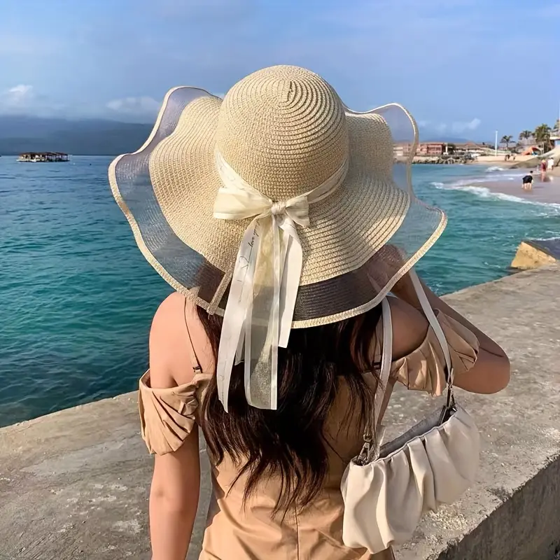 elegant wide brim sun hat with bowknot uv protection breathable straw beach cap for for outdoor leisure details 5