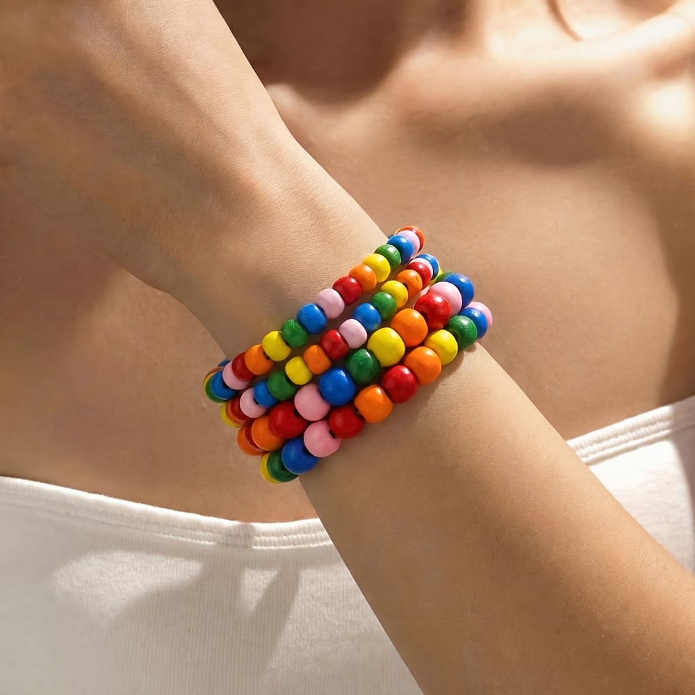 Image of 4pcs Bohemian Rainbow Wood Bead String Classic Stacked Bracelet Set Suitable For Men And Women Holiday Party Wear And Holiday Gifts For