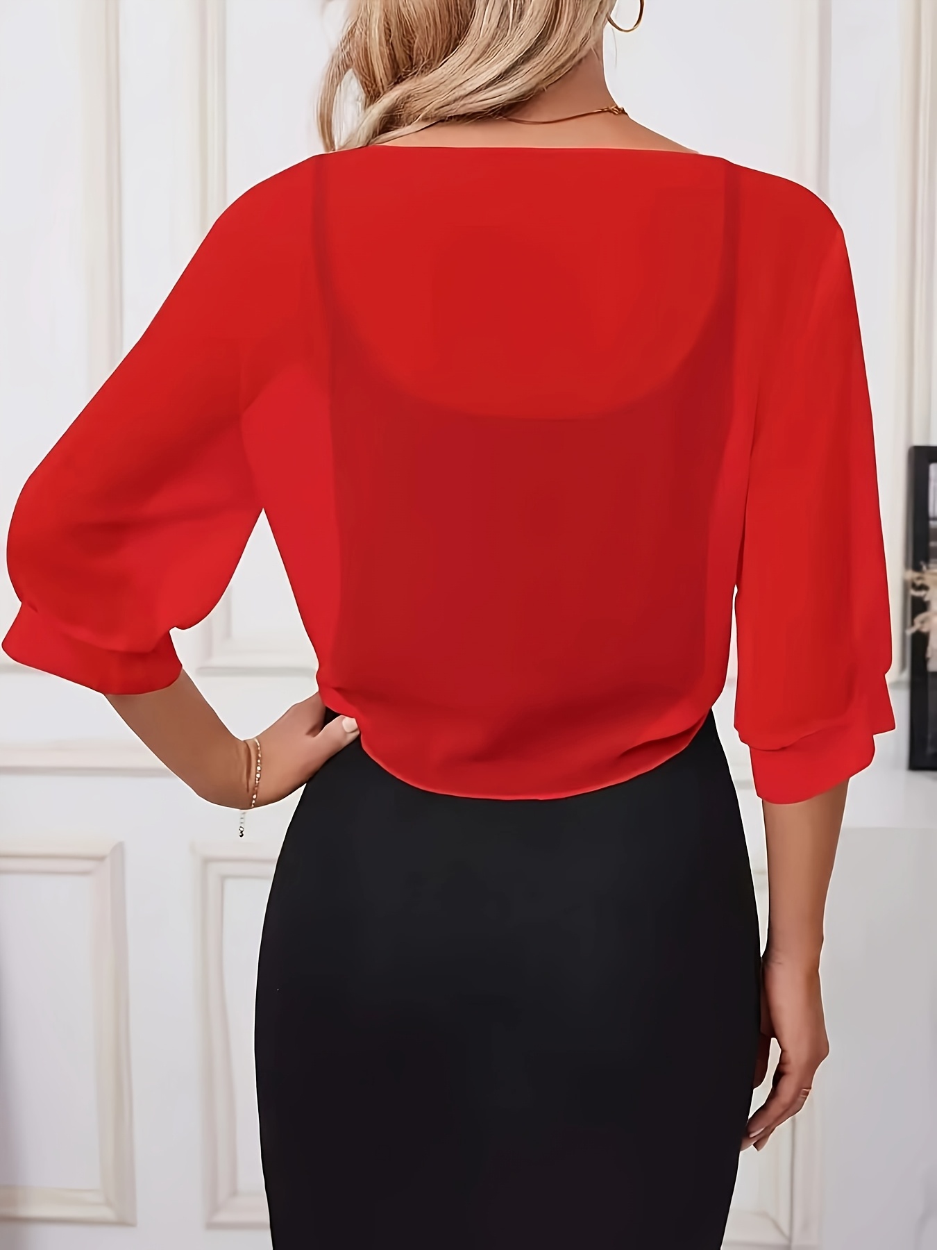 An Elegant Front-Button Sheer Shirt with a Shawl Design.