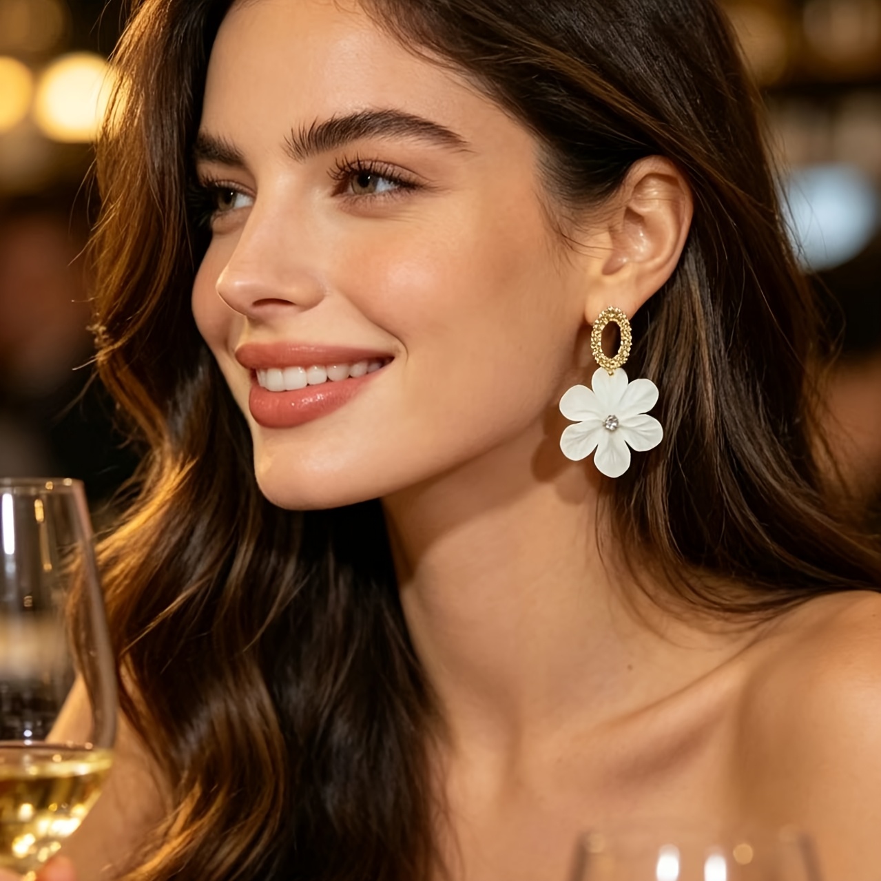 white flower earrings sold on Temu United States