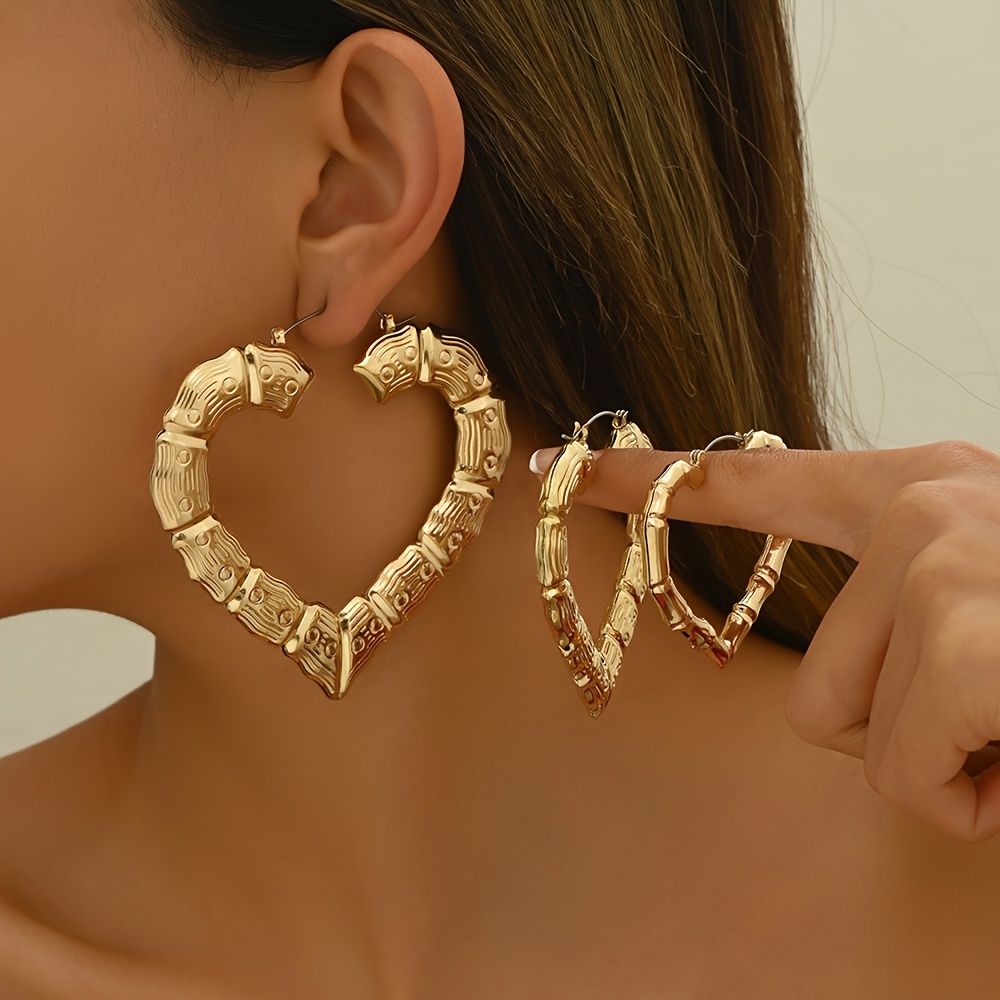 

3 Pairs Of Love Heart Shaped Bamboo Texture Line Fashionable Earrings
