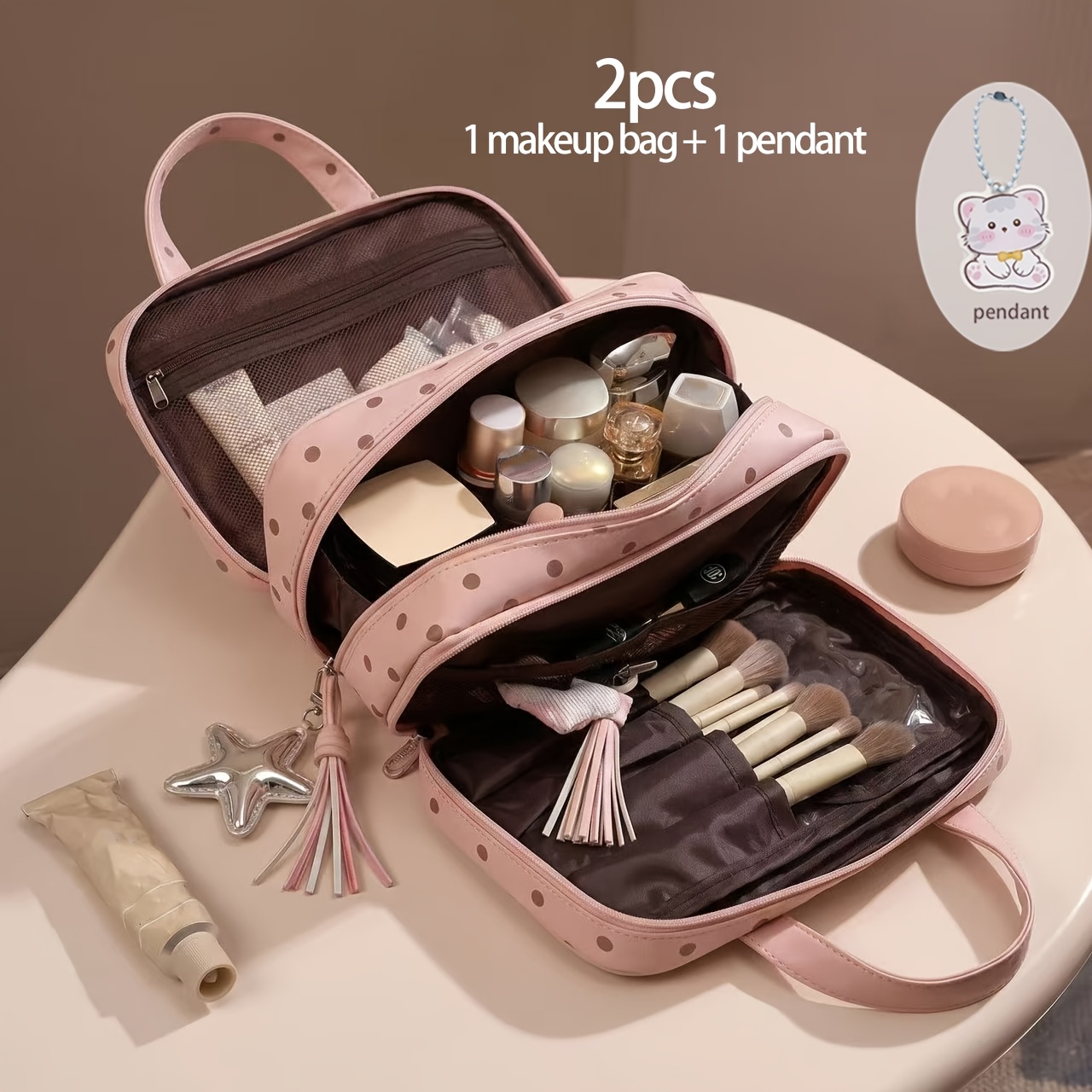 2pcs Set: 1 Makeup Bag + 1 Pendant. New Material, Large-capacity Layered Design Cosmetic Organizer. Features Multi-tier Compartment Design, Hung on Luggage. Interior Multiple Mesh Pockets for Organization. Suitable as a Travel Cosmetic Bag