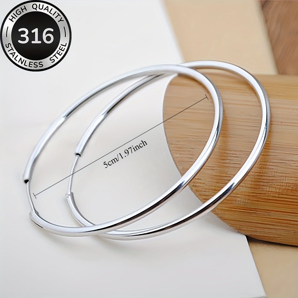 high quality   steel large hoop earrings comfortable and versatile simple and elegant suitable for daily wear or parties fashionable womens jewelry accessories a delicate gift for women Product details 0