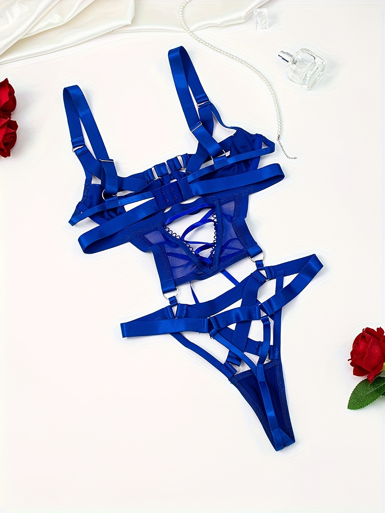 Harness Body Blau Damen Bodysuit mit Crisscross-Trägern und Hollow-Out Design. Exklusive bei RaiX Shop Konstanz.