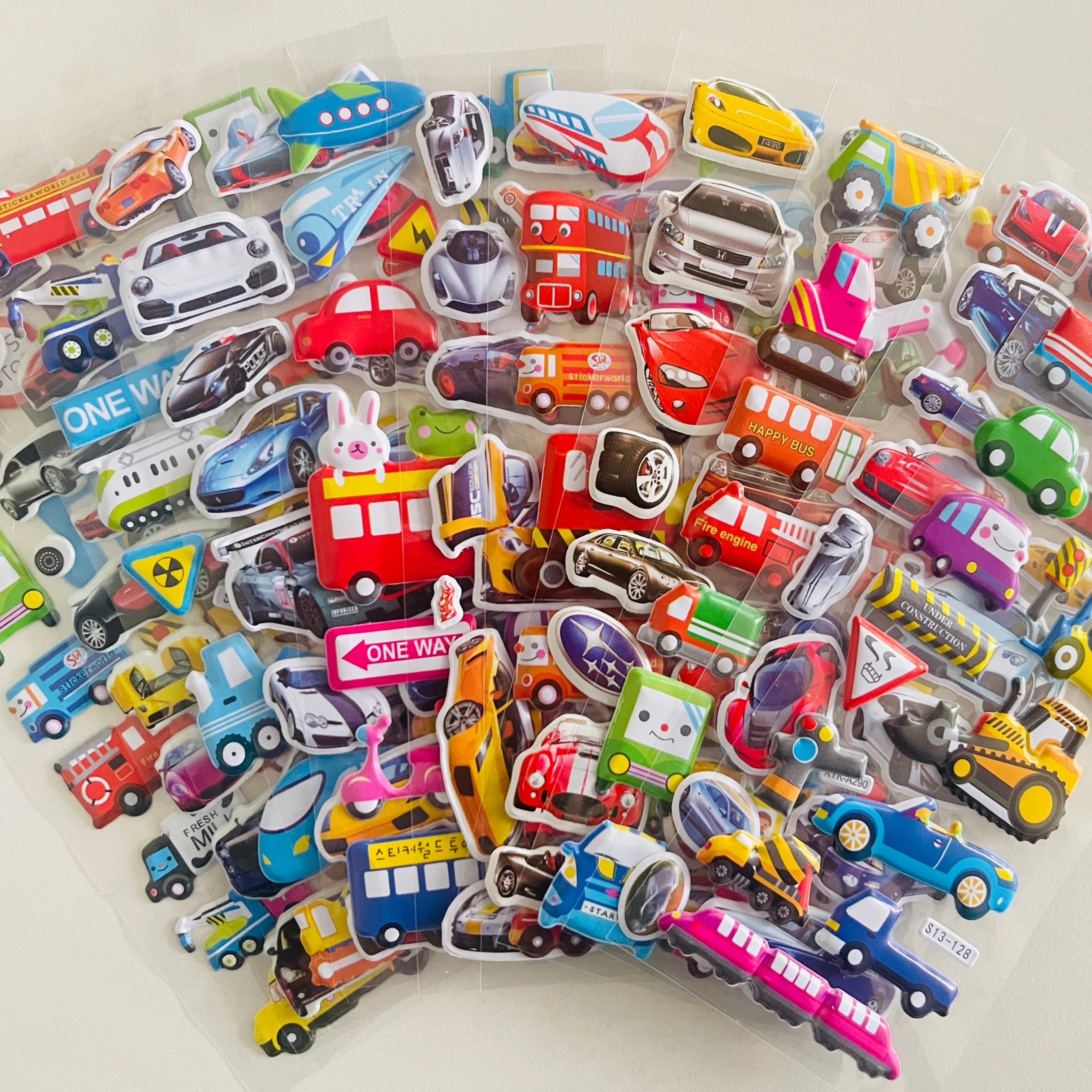 

12pcs/pack Racing Cannon Car Stickers Cool Sports Car Decoration Mobile Phone Stickers City Cartoon Traffic Excavator Bus Engineering Car Tool Stickers