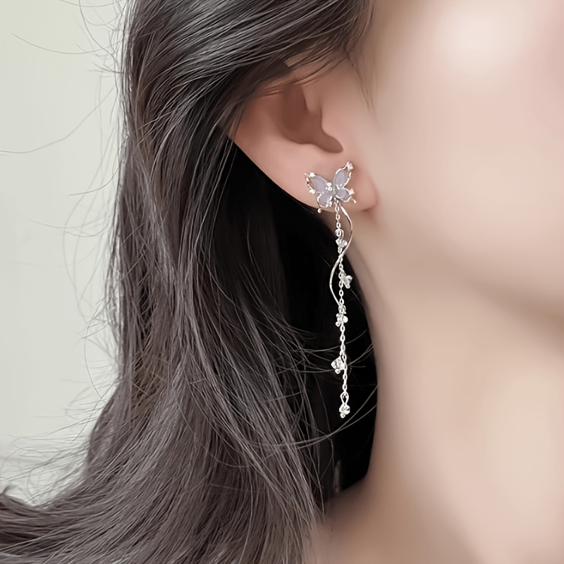 Image of A Pair Of Fashionable Tassel Earrings With Luxury And High-end Temperament, Earrings With A Niche Design And Exaggerated Earrings