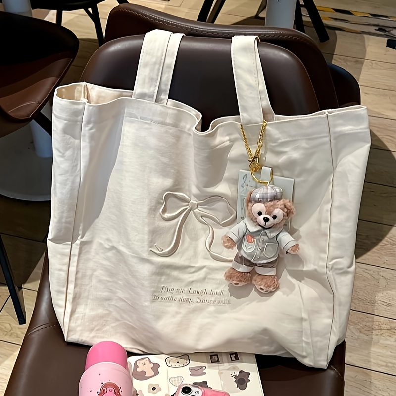 

Large Capacity Canvas Tote Bag With Bow Embroidery, No-closure Shoulder Bag, Hand Washable, Carrier, With Teddy Bear Charm, For Women, Ideal Gift