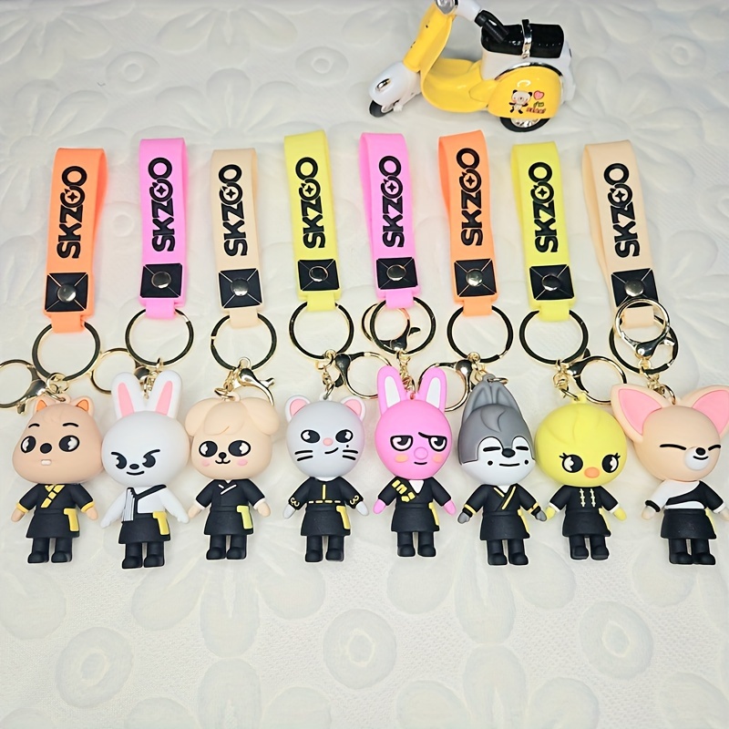 

Charming Pvc Doll Keychain - Cute White Accessory For Bags & Cars, Fashionable Men's Gift