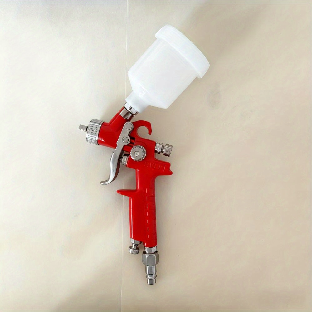 mini hvlp spray gun with 0 5mm 0 8mm 1 0mm nozzles selectable bore size gravity feed for precise painting projects durable aluminum construction precise spraying ergonomic spray gun Product details 5