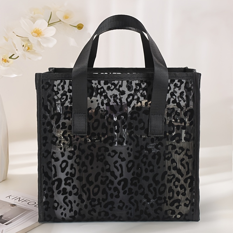 Image of Black Bag - Lightweight And Breathable Travel And Beach Organizer With Double Handles, Cosmetic Storage, Stylish Cutout Design, Beach Bag, Handheld Storage Pouch, Back-to-