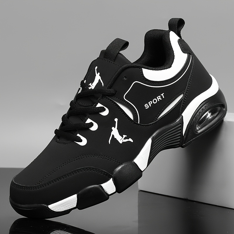 mens air cushion sneakers lightweight running shoes featuring a breathable synthetic upper and cushioned sole ideal for   walking and daily wear   in black and white   for athletic use sturdy and easy to cl
