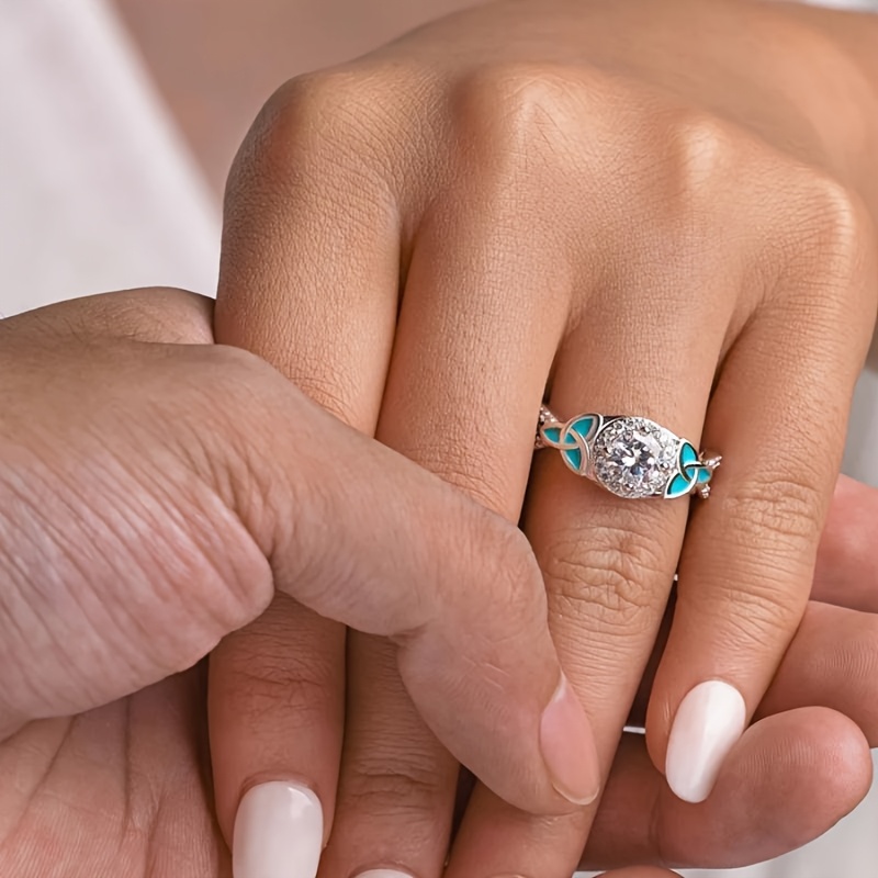 Women's Zirconia Infinity Anniversary Ring with Enamel Leaf Celtic Knot