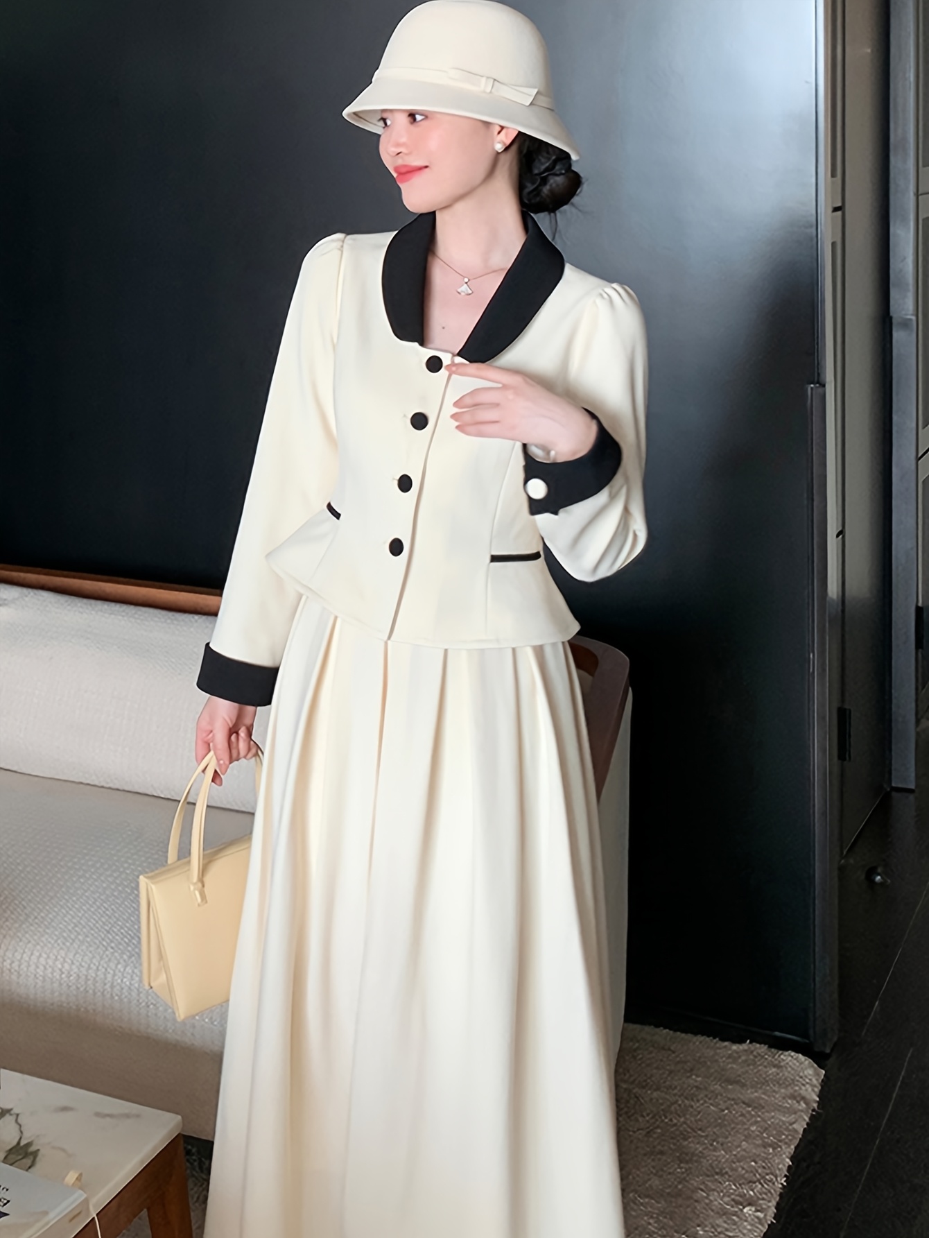 Flatlay of Newness Parisian Chic Two Piece Suit showcasing its luxurious polyester fabric and elegant design Perfect for spring and fall