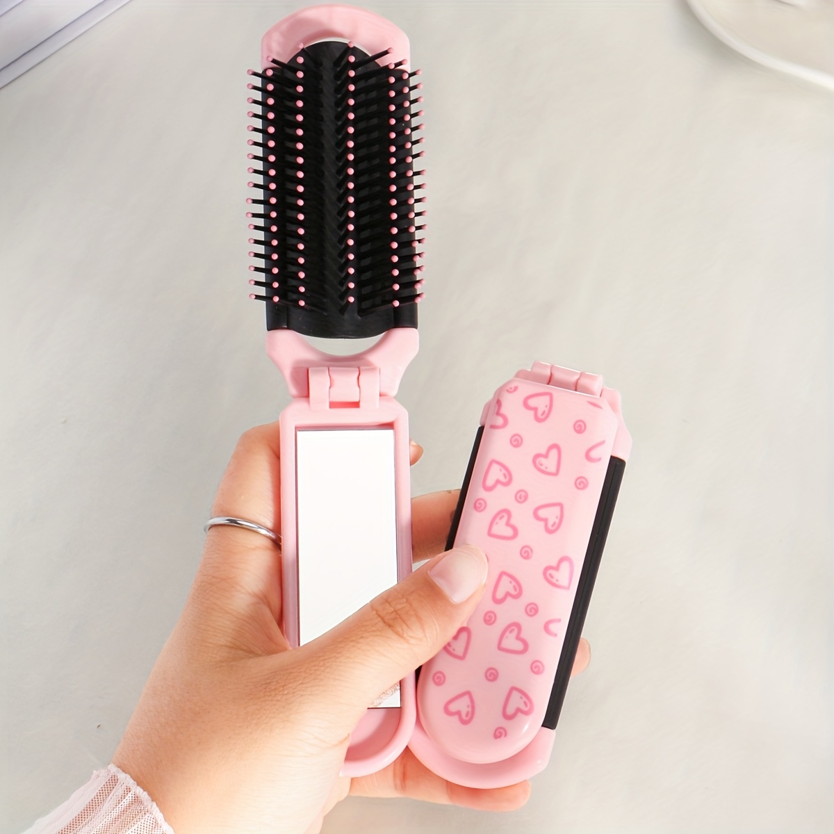 TEMU 1pc Foldable Hairbrush With Built-in Small Mirror, Bow And Heart Elements, Compact And Portable, Suitable For Travel