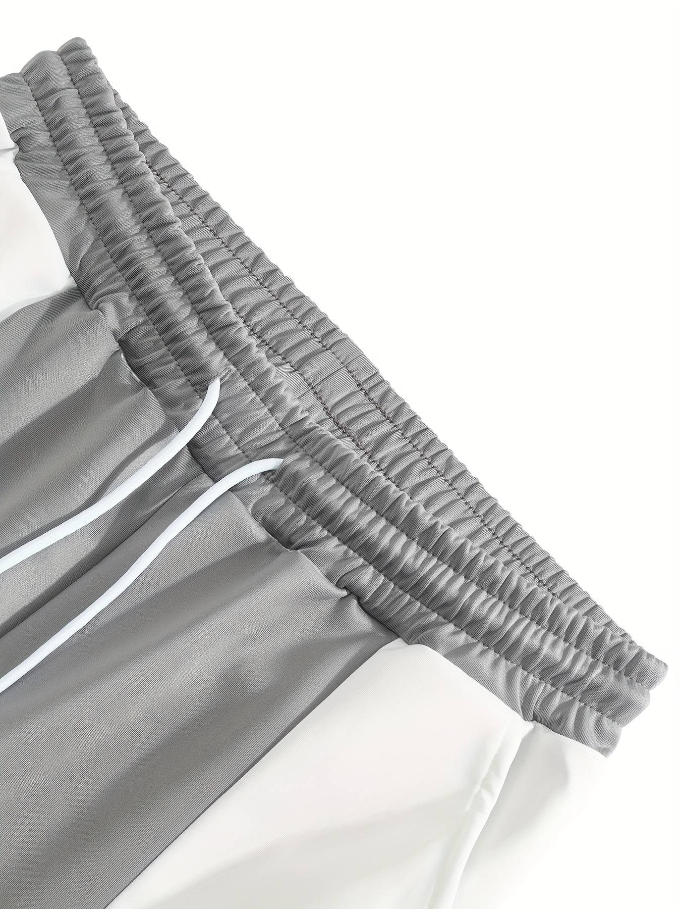 Men'S Color-Blocked Casual Pants Feature a Stylish Design with Comfortable And Structured Fabric. The Drawstring Waist Fits The Body Well, Making It Trendy And Eye-Catching. with a Loose Straight Cut