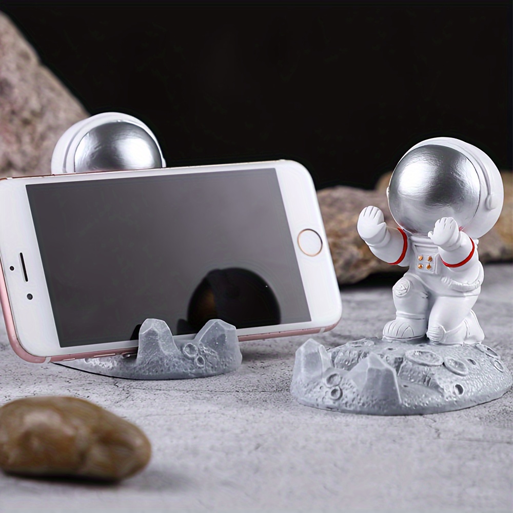 

1pc Silvery Abs Astronaut Hand Raised Graphic Desktop Stand Cute Astronaut Creative Desktop Decoration Suitable For Mobile Phone Stand