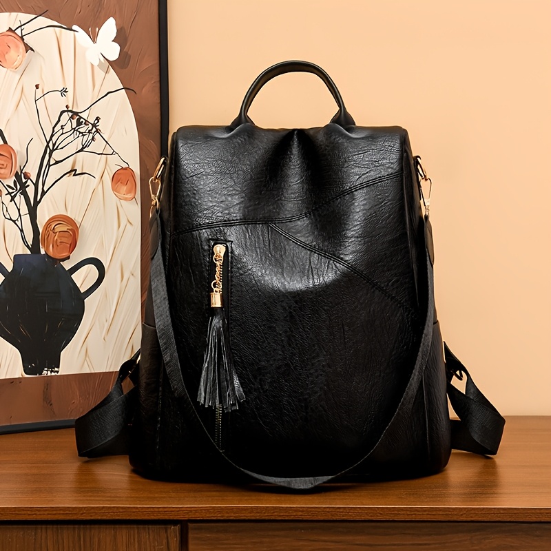 

Fashion Leather Women's Backpack With Adjustable Straps, Tassel Zipper Closure, Solid Color, Polyester Lined, - Black, Light Brown, Red