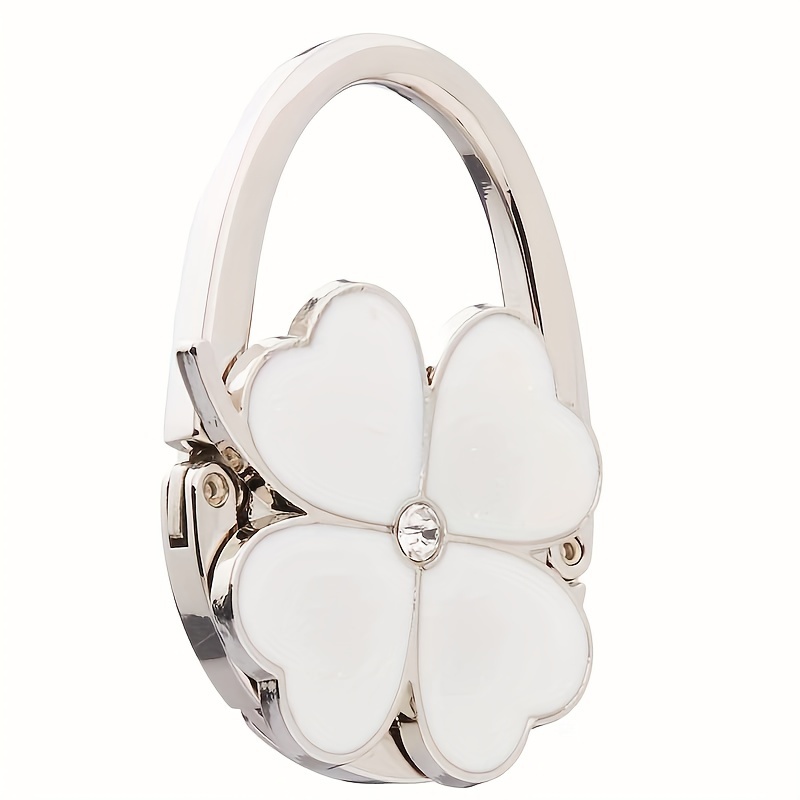 1pc Elegant Clover White Design Foldable Handbag Hook - Chic Aluminum Alloy Purse Table Hook with Heart-Shaped Floral Accent, Portable Metal Bag Holder for Stylish Accessory Lovers