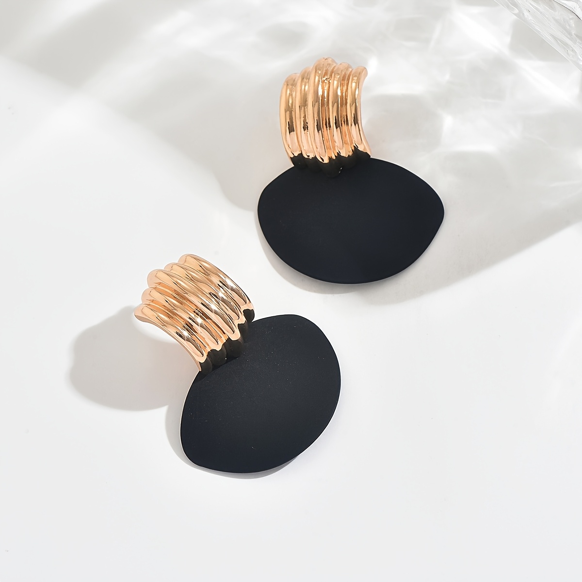 Women's Exaggerated Metal-Textured Wave-Pattern Tassel Earrings