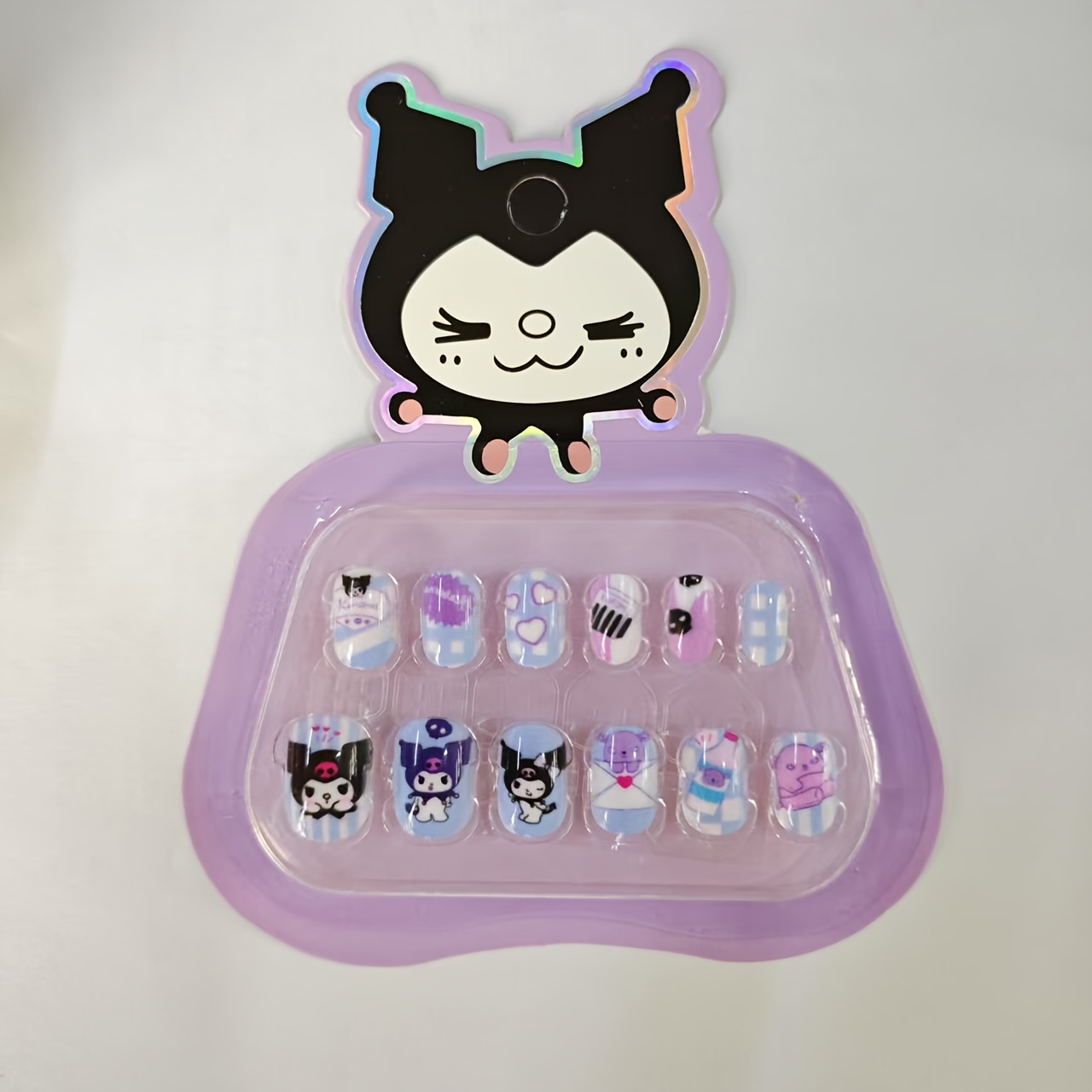 Set Of Press-on Nails Featuring Adorable Designs From , Including Hello Kitty, My Melody, Kuromi, , Cinnamoroll, And . Fake Nails Make Perfect Gifts For