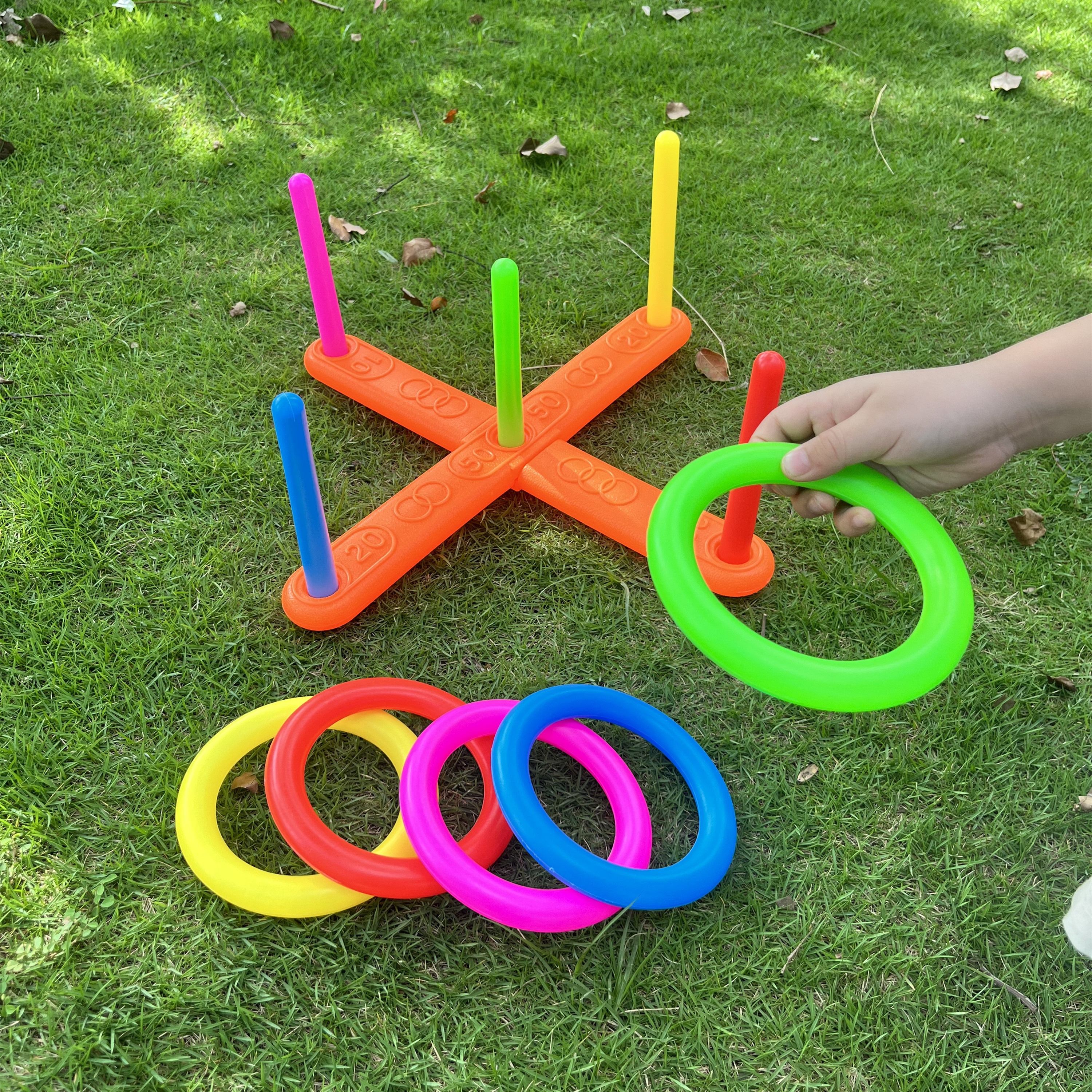 

Ring Games: Outdoor Toss Game Set With And A Target Board - And Competitive Play - Suitable For Indoor And Outdoor Use - Includes Red, Yellow, Blue, Green, And Pink Rings - Plastic