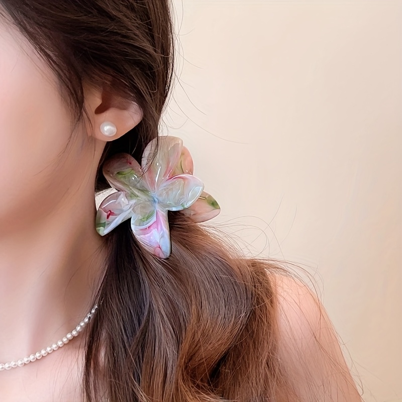 a smudged color floral claw clip dopamine flower claw clip - Temu Oman