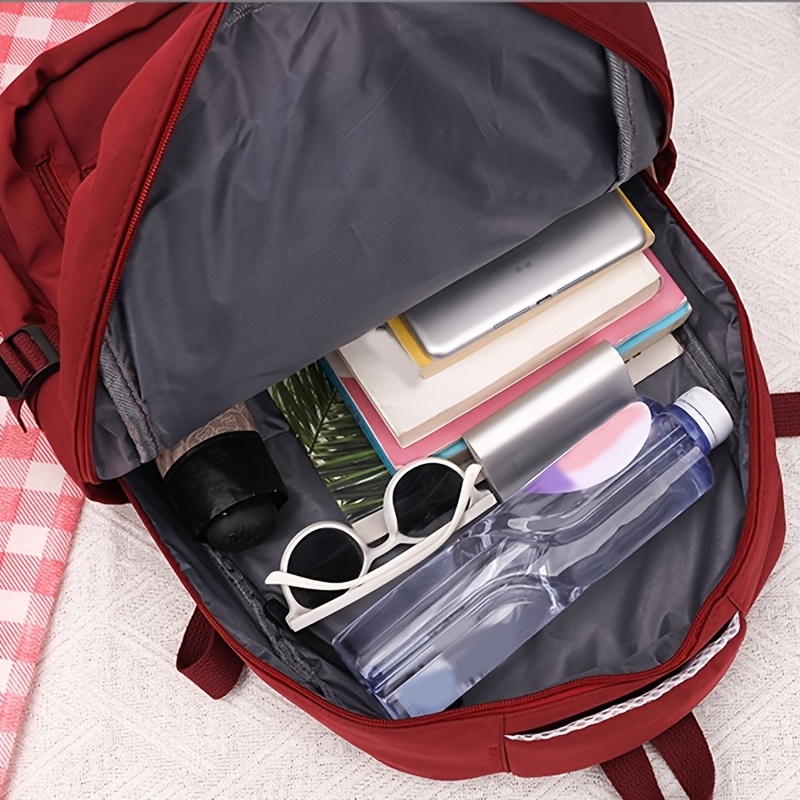 red casual backpack with adjustable shoulder straps multiple pockets lightweight durable polyester for travel school daily   stylish functional design daily   bag minimalist backpack lightweight bag details 4