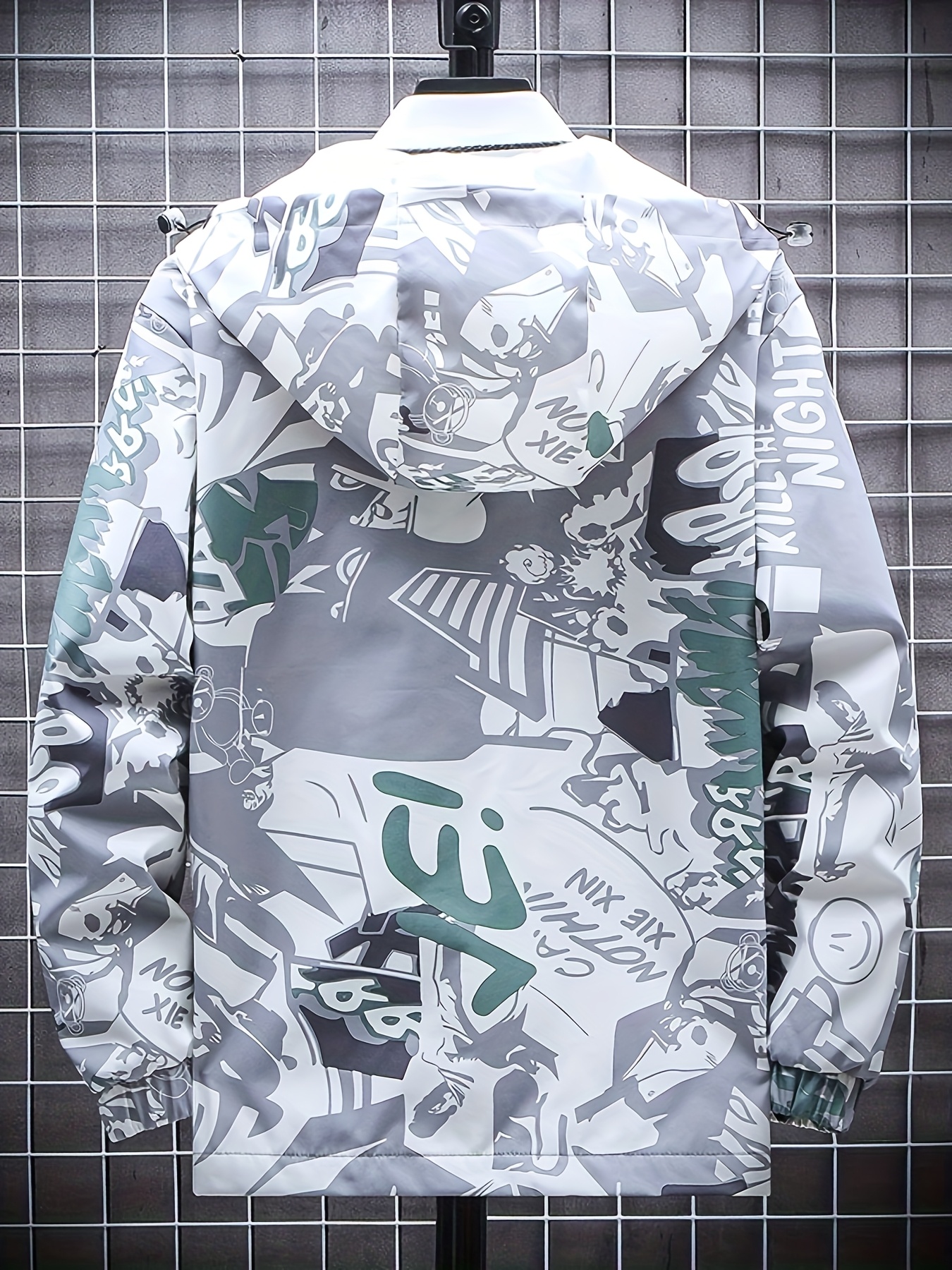 Chamarra popular y elegante para hombres con capucha y de longitud media con graffiti de moda de primavera y otoño. Chamarra versátil popular para hombres y mujeres con el mismo estilo.