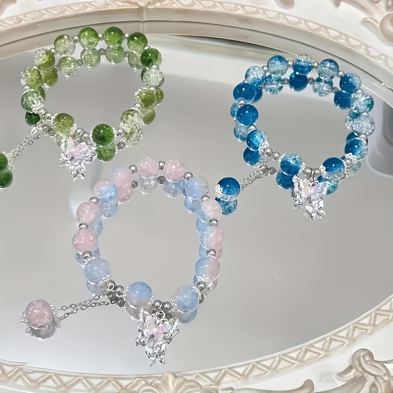 

Bracelet Élégant en Perles de Verre en de Papillon - Accessoire de Mode Coloré et Vibrant pour Femmes | Cadeau pour Couples & Amis | Idéal pour Tenue Décontractée & Toutes