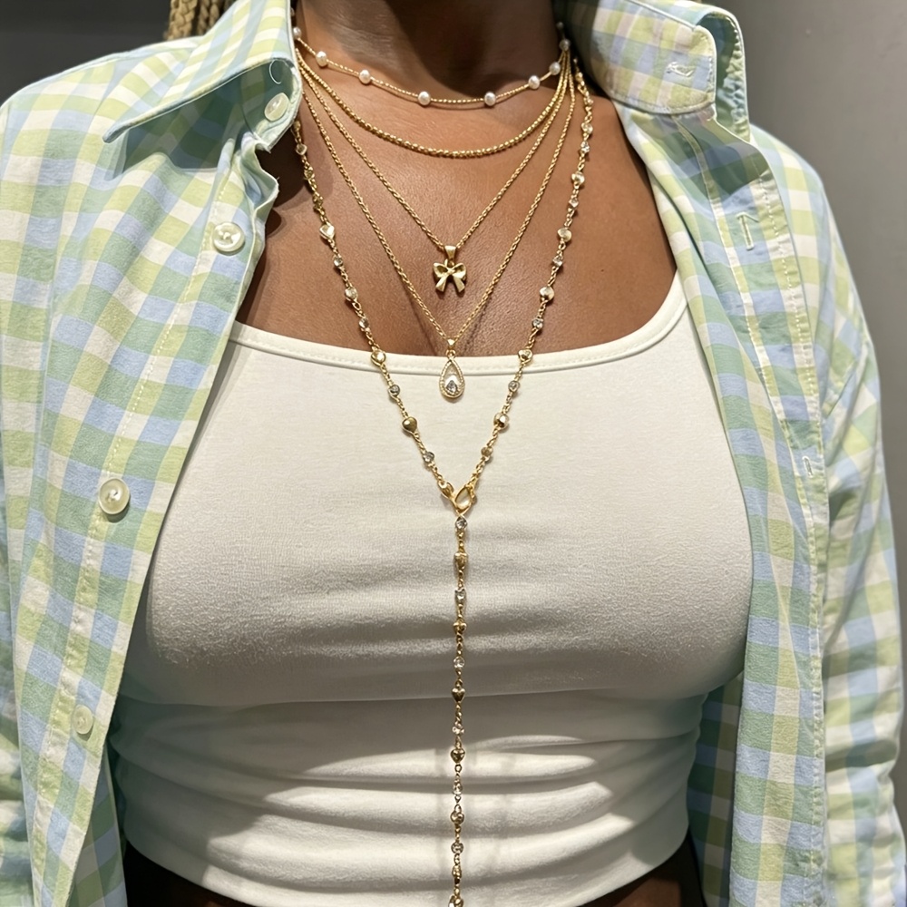 TEMU Ensemble de 5 à perles et nœud papillon, 4 styles de chaînes complémentaires, chaîne courte pour clavicule modifiant les épaules et le cou,