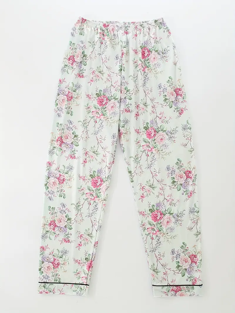 a floral pajama set featuring a short sleeve button up top elastic waist shorts and long pants suitable for year round wear casual womens sleepwear in Product details 3