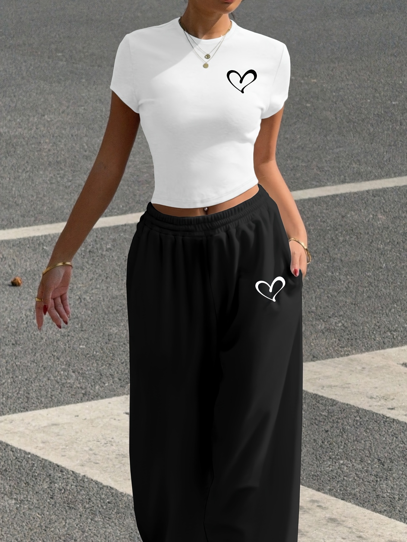 A Stylish Two-Piece Set for All Seasons, Featuring a Heart Print Casual Outfit, Consisting of a Fitted White Short T-Shirt And Tapered Jogger Pants, Machine Washable, Perfect for Street Fashion And Vibes