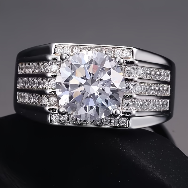 item picture a mens ring made of s925 925 silver plated featuring a   moissanite stone with a 3ct main stone its   design exudes   making it   gift for weddings business banquets anniversaries