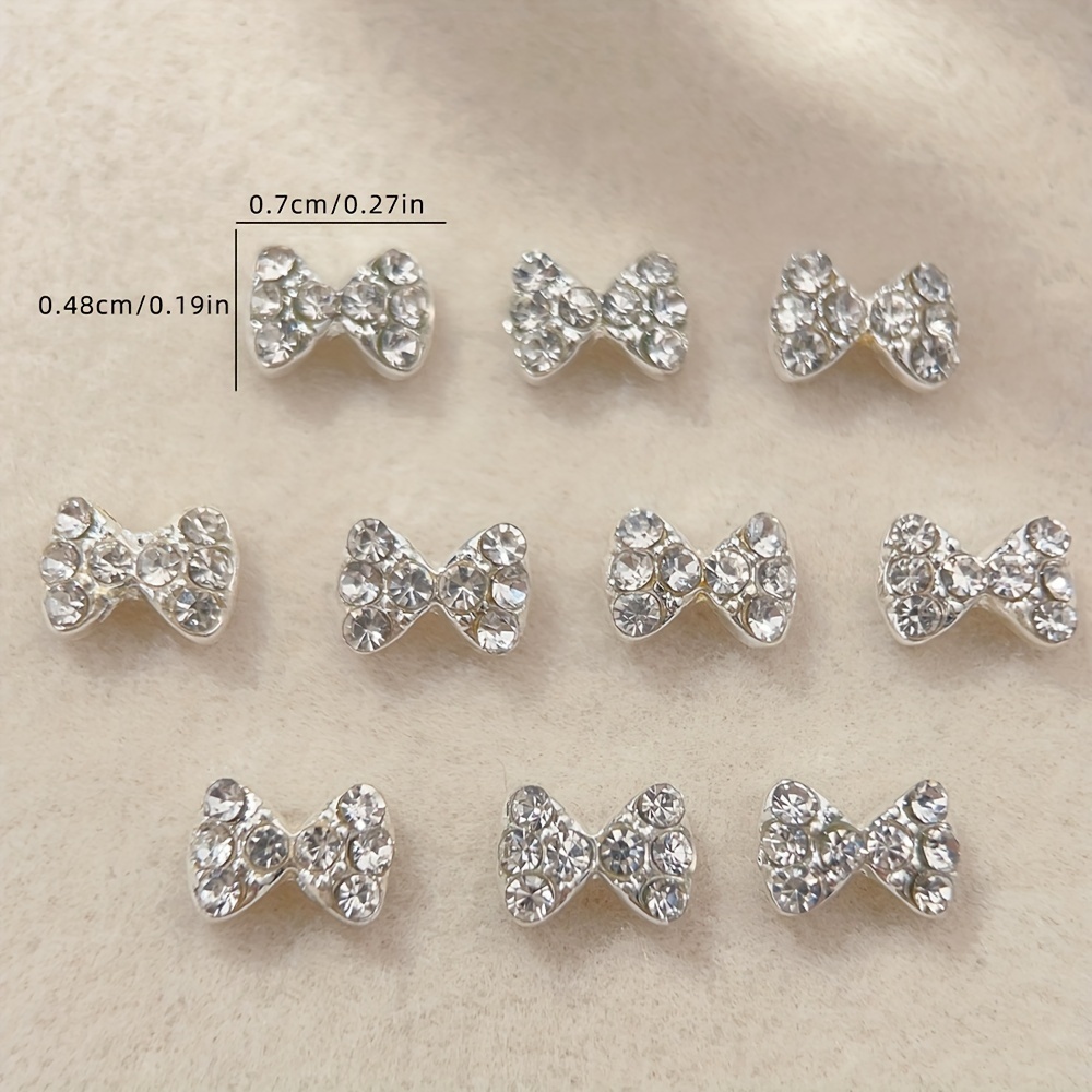 Set Of 10 Elegant Alloy Nail Drills With Full Diamond Bows, Featuring Rhinestones And Alloy Decorations For Nail Art, Including Charms And Gems