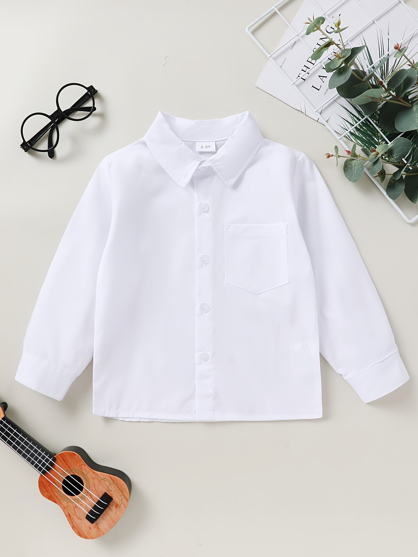 boys white shirt sold on Temu United States
