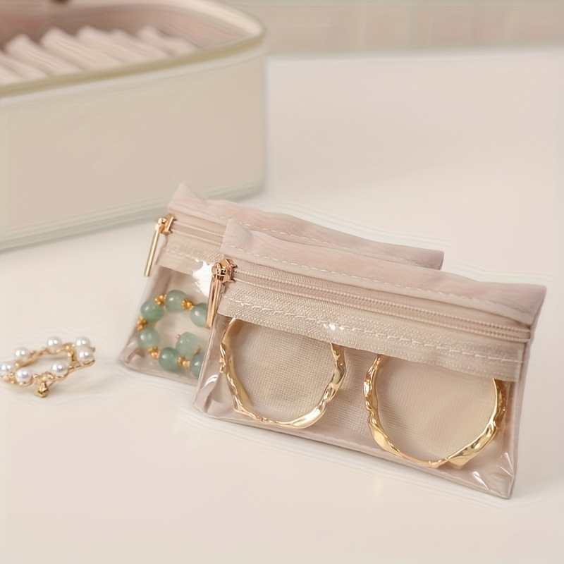   portable jewelry box transparent jewelry organizer large   leather jewelry organizer holiday gift for women home   travel use simple multifunctional jewelry box transparent jewelry bag storage bracelet earrings golden necklace etc non 33 holiday gifts for     lovers such as christmas halloween birthday labor day   etc jewelry boxes Product details 8