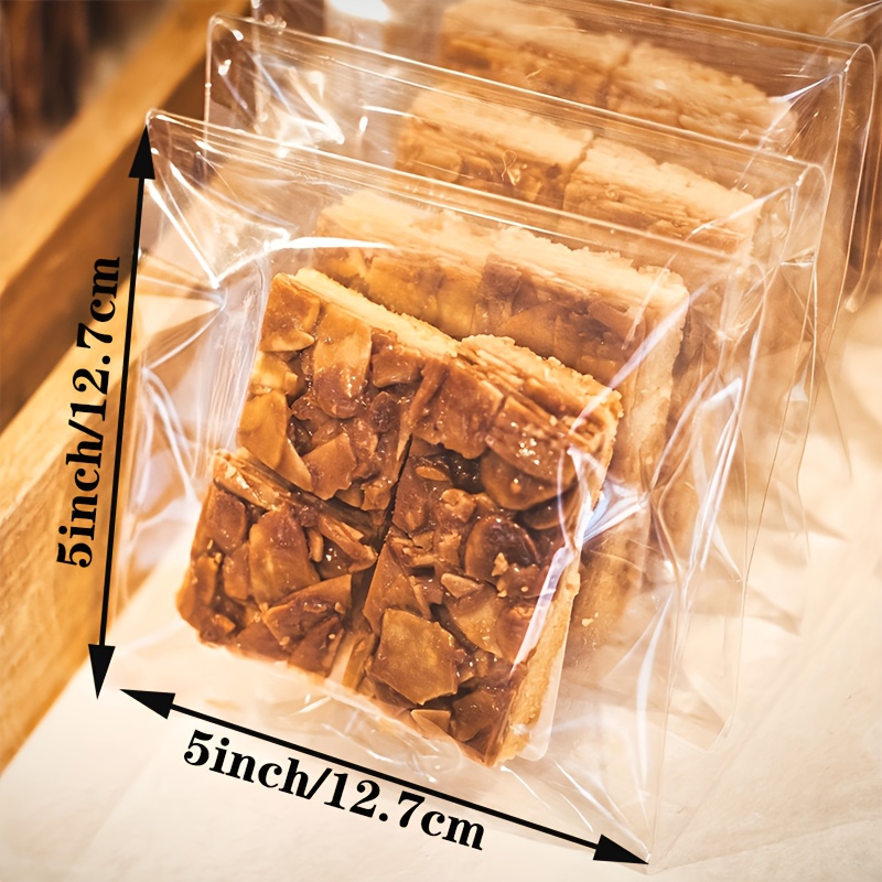Image of 100pcs Clear Self-sealing Cookie Bags - Resealable Cellophane Treat Bags For Gifts, Perfect For Home Kitchen & Bakery Supplies And Party Favors Bag.