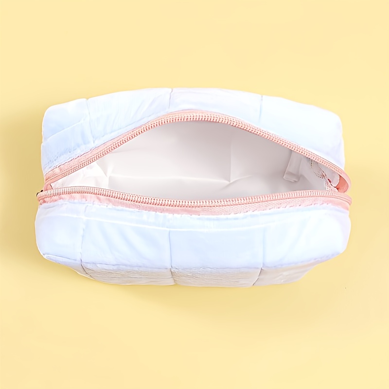 a cosmetic storage bag designed with a chic and minimalist   for students and women for travel storage makeup bags vacation organizers and large capacity cosmetic cases   suitable for lipsticks brushes skincare products phones   and small items making it versatile for home use gifts and vacations featuring a bohemian style Product details 7