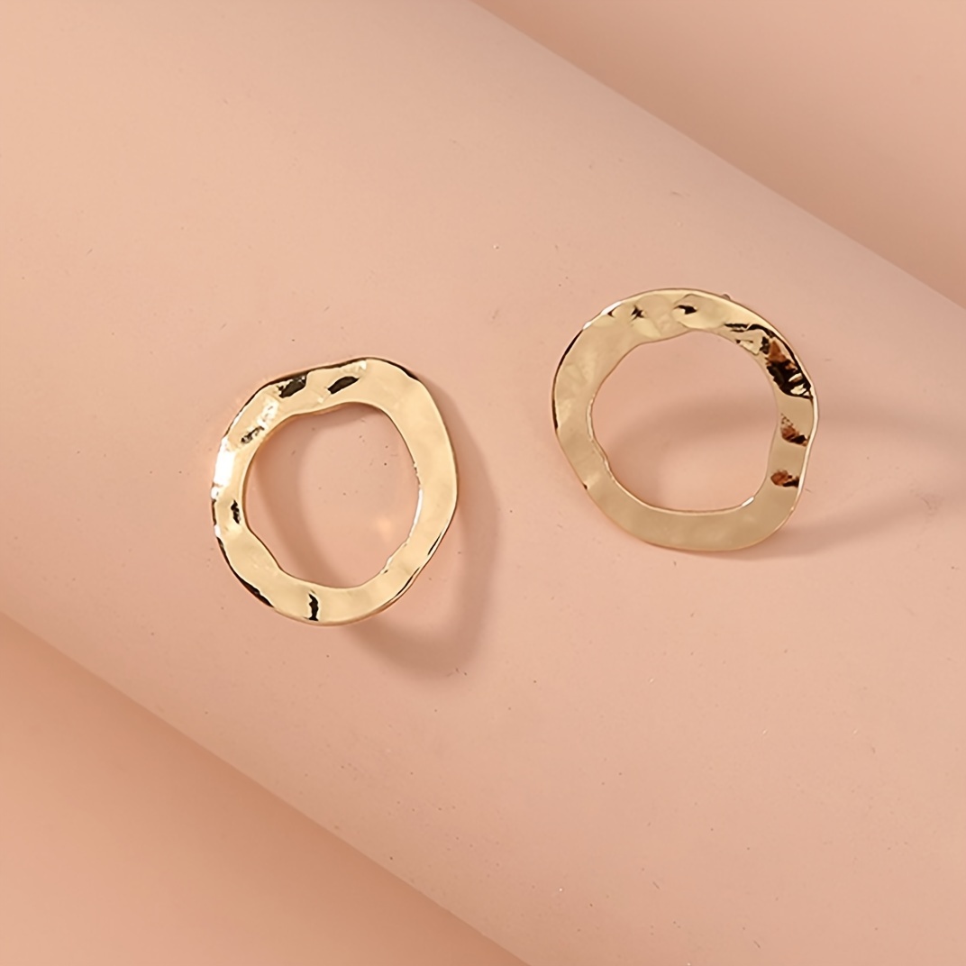 Image of A Pair Of European Minimalist Fashion Trendy Wavy Round Iron Stud Earrings For Women