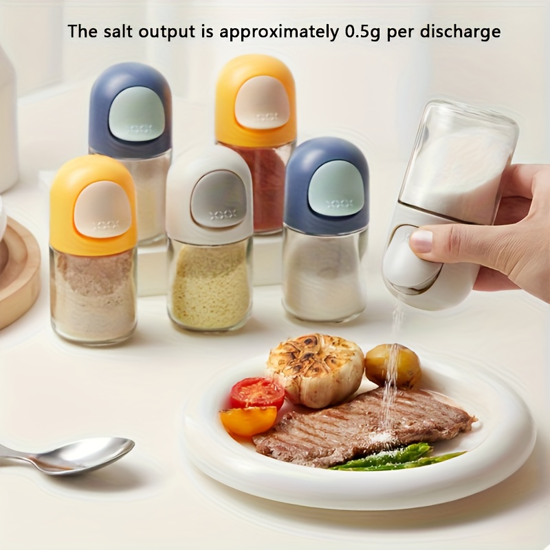 glass spice jar with precise dispenser push button controlled seasoning container anti   clear measurement cup for salt pepper herbs   countertop organizer ideal gift for home   chefs cooking essentials modern kitchenware   lid culinary enthusiasts Product details 0