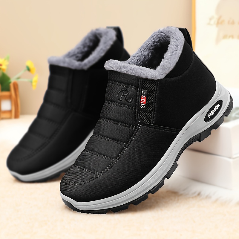 mens winter footwear featuring warm fleece lining non slip ankle design and plush   ideal for outdoor hiking and trekking Product details 8