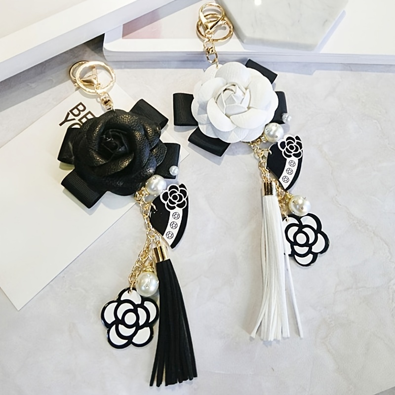 

Faux Leather Camellia Flower Keychain With Long Tassel, Faux Pearl Accents, Korean Trendy Bag Charm, Car Key Hanger, Fashion Jewelry Accessory