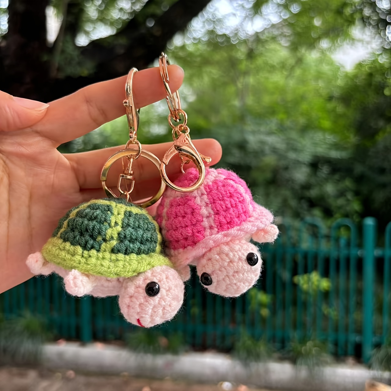 

Crochet Turtle Keychain: Adorable Handmade Turtle In Pink Or Green, Perfect For Bags, Cars, And Lamps - No Battery Required