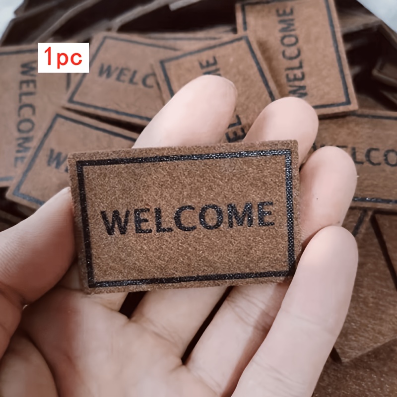 Image of 1pc Miniature Realistic Door Mat In Dark Brown With "welcome" | 1:12 Scale For Dollhouse Decoration, Ideal For Collectors And , Perfect For Holiday Gifts